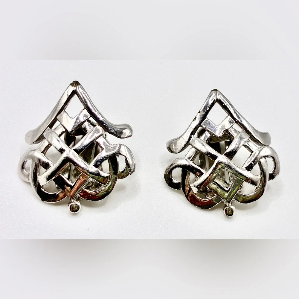 Vintage SIGNED “Jeray” Celtic Knot Clip On Earrings In A Silver Tone